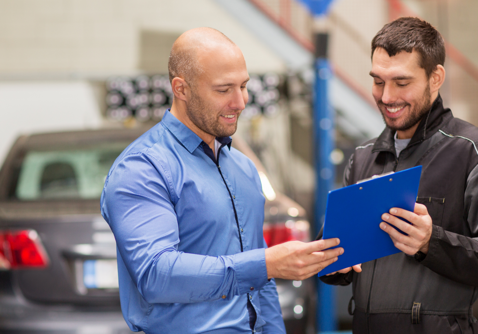 Man having his car repaired, covered by The Police Credit Union's Mechanical Repair Coverage plan.