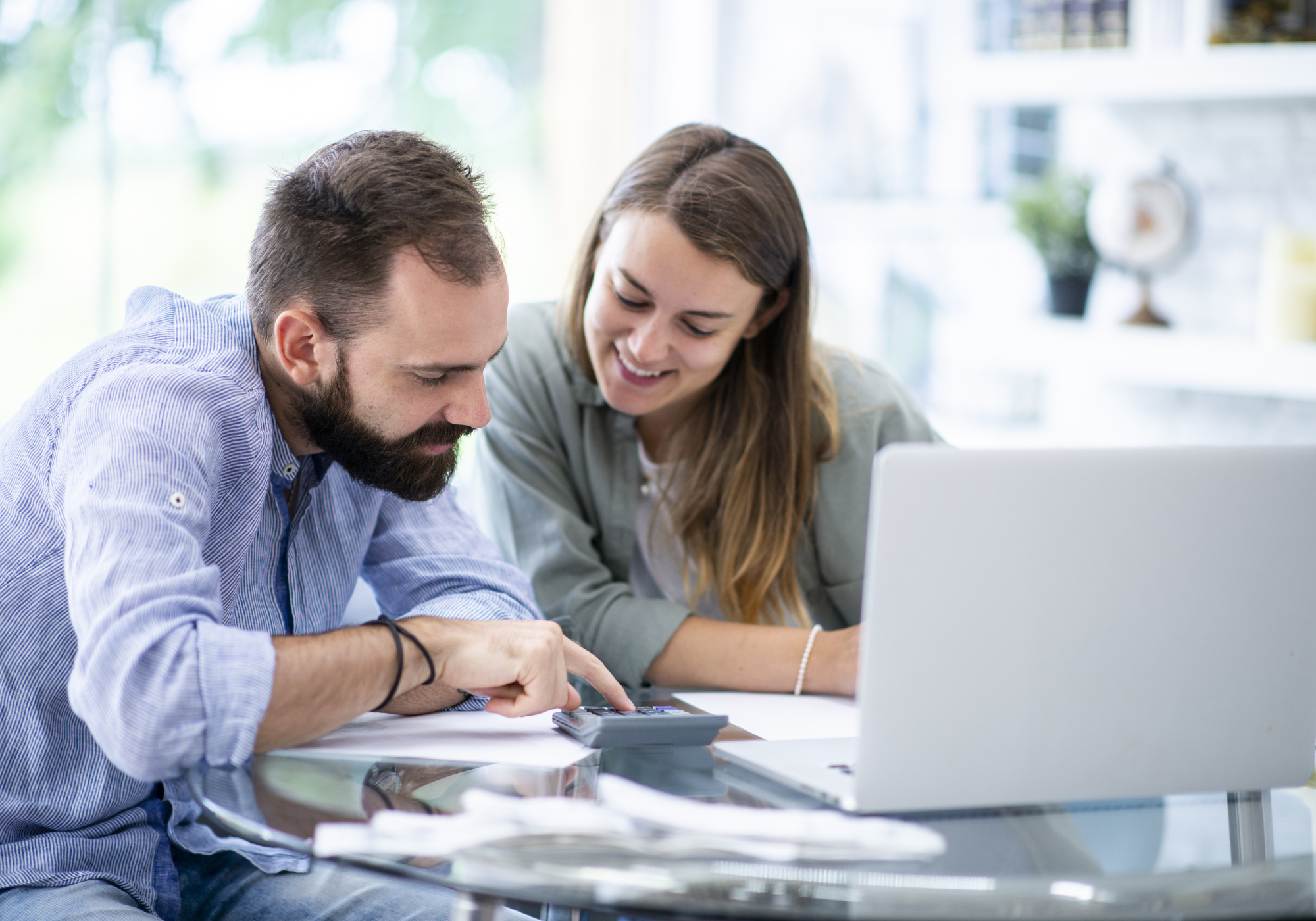 Couple discussing their budget and financial plans at home